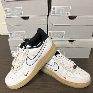 Nike White Leather Air Force 1 07’ Sneakers with Orange and Black. Multi sizes.